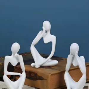 Trio de estatuetas de gesso para decoração